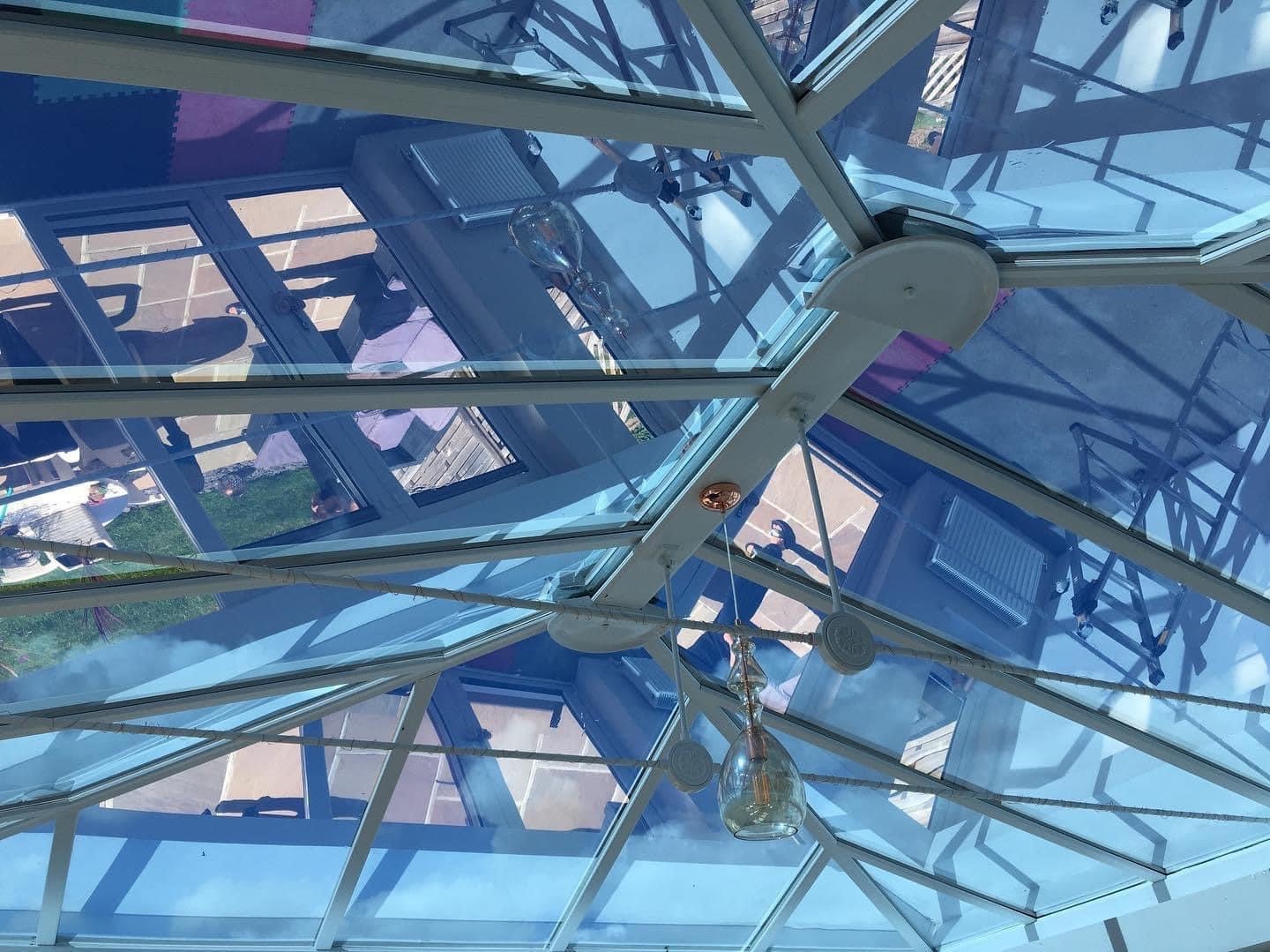 image of a conservatory roof that has been tinted with window film to reduce heat and glare